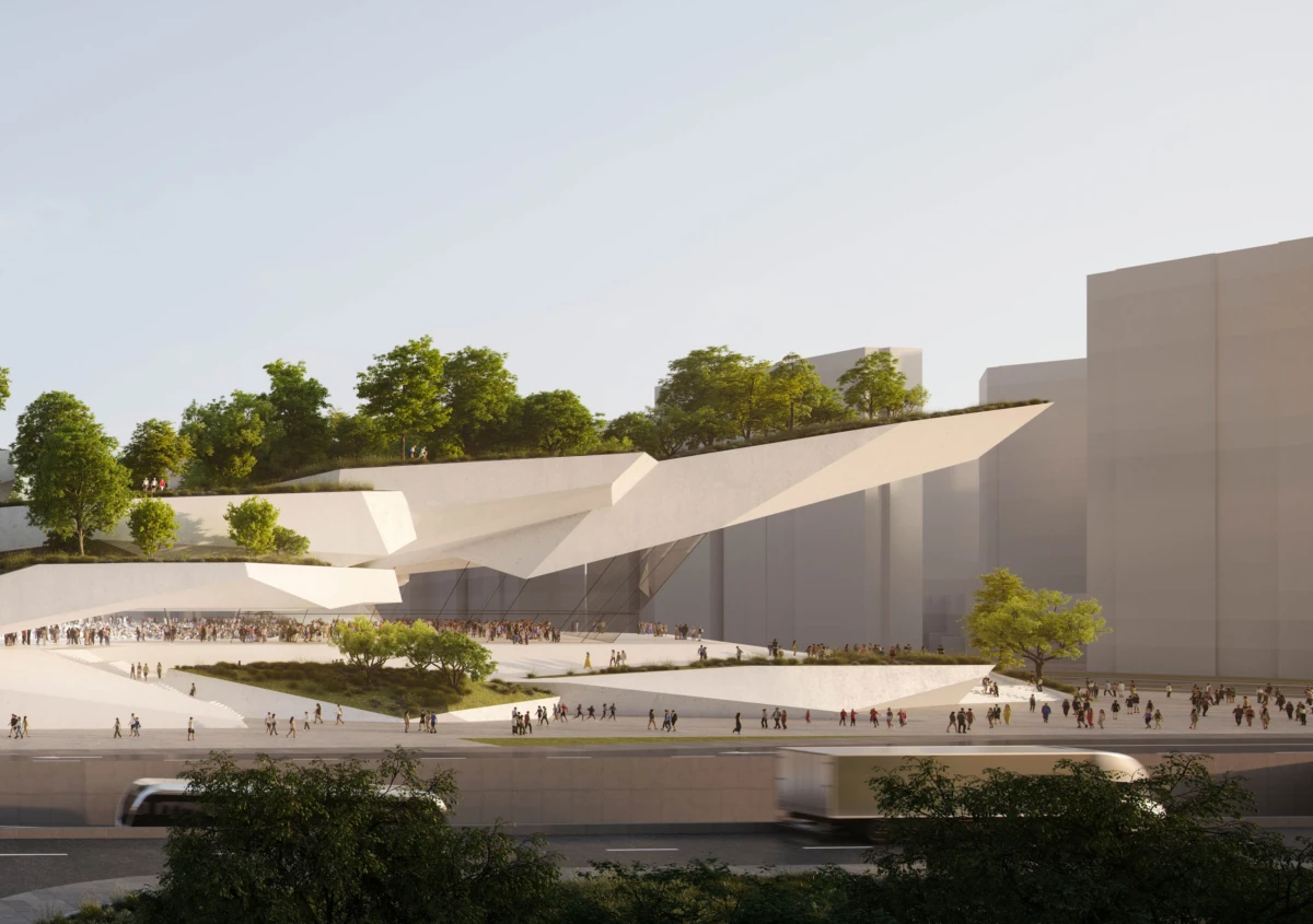 Outdoor modern architectural complex with angular white terraces, trees, and crowds; a tram crosses a road in the foreground.