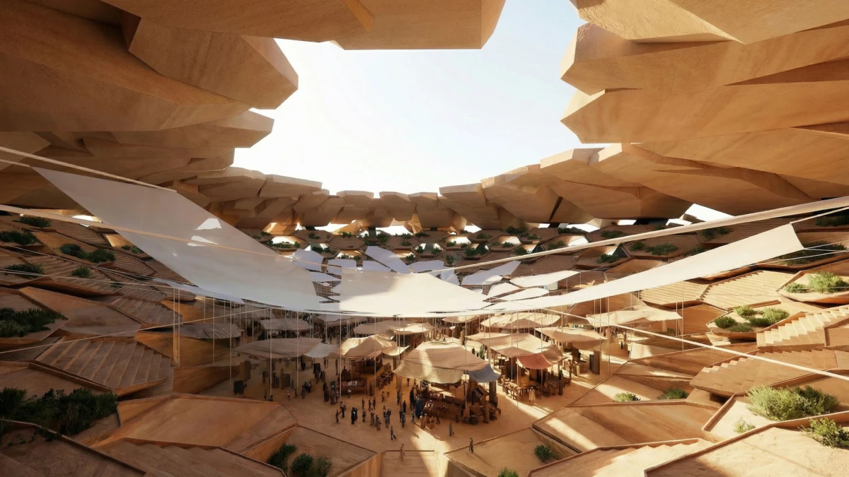 Open-air desert courtyard with stacked wooden walls and large white shade sails, a crowd gathered around market stalls.