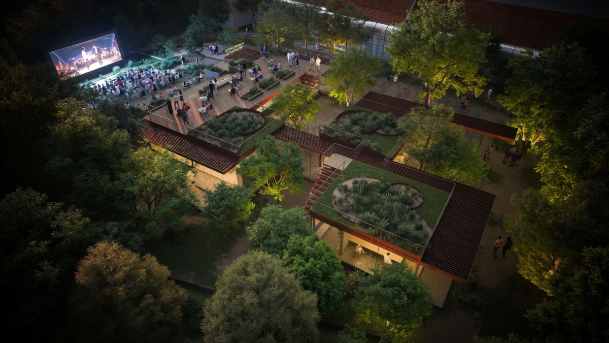 Evening aerial view of an urban rooftop garden with elevated circular planters and wooden walkways; a large outdoor cinema screens a crowd.