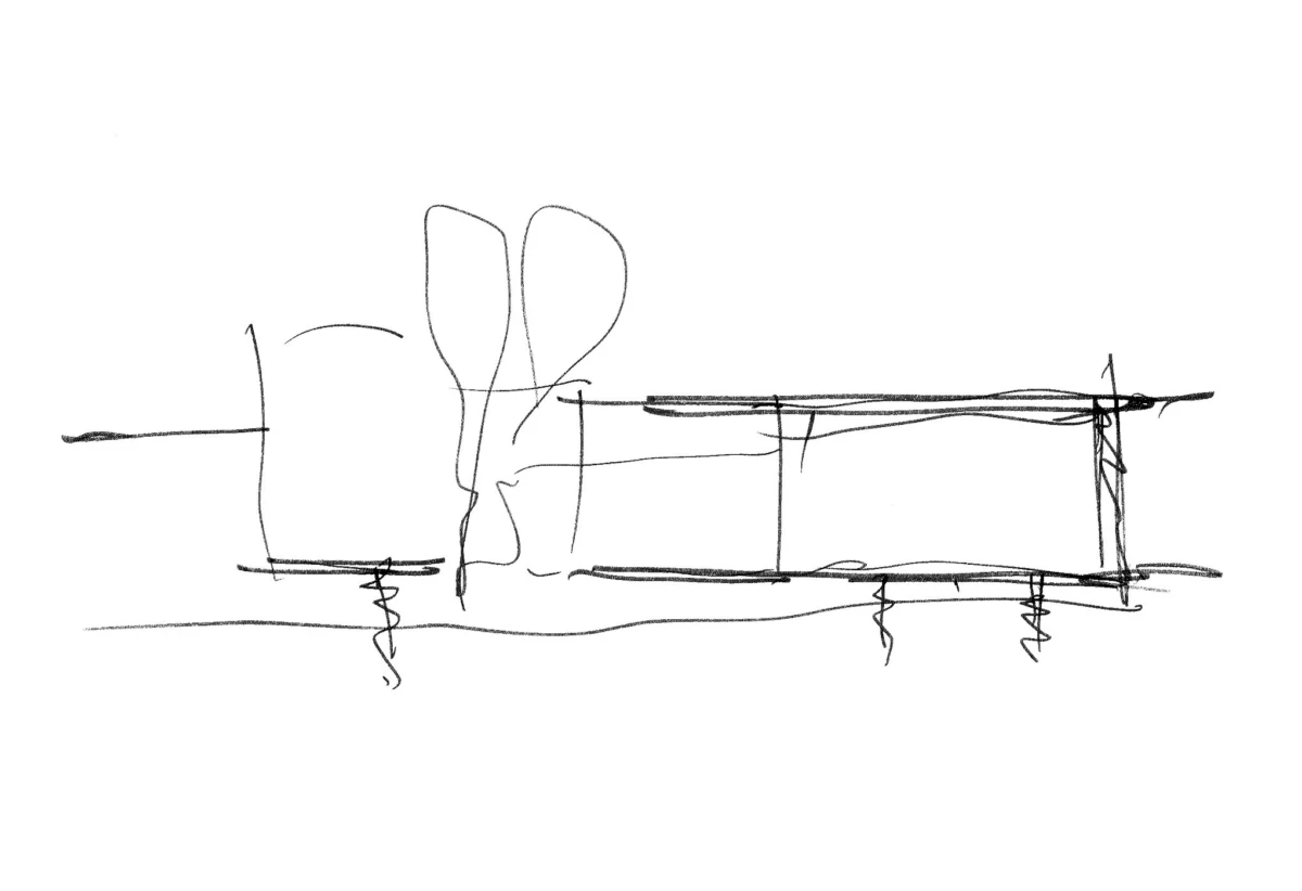 Rough line drawing of a long rectangular bench on legs with two tall rounded shapes resembling trees behind it.