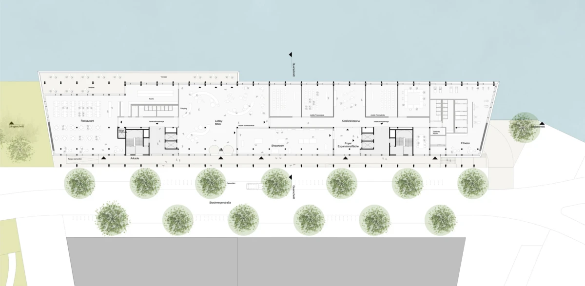 Architectural site plan of a long rectangular building along a waterfront, showing interior rooms and a tree-lined street.