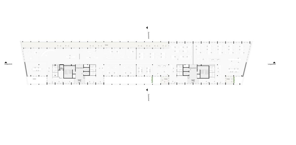 Architectural floor plan of a long trapezoidal office with two central cores and rows of workstations.