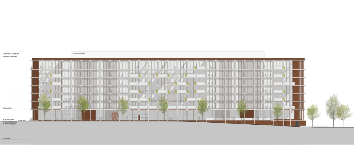 Multi-story glass-fronted office building facade with evenly spaced windows on a tree-lined street.