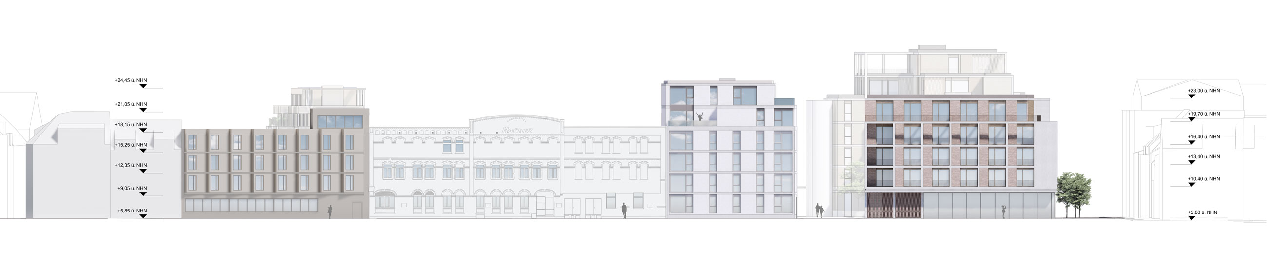 Modern mixed-use buildings line a city street, with a tree on the right.