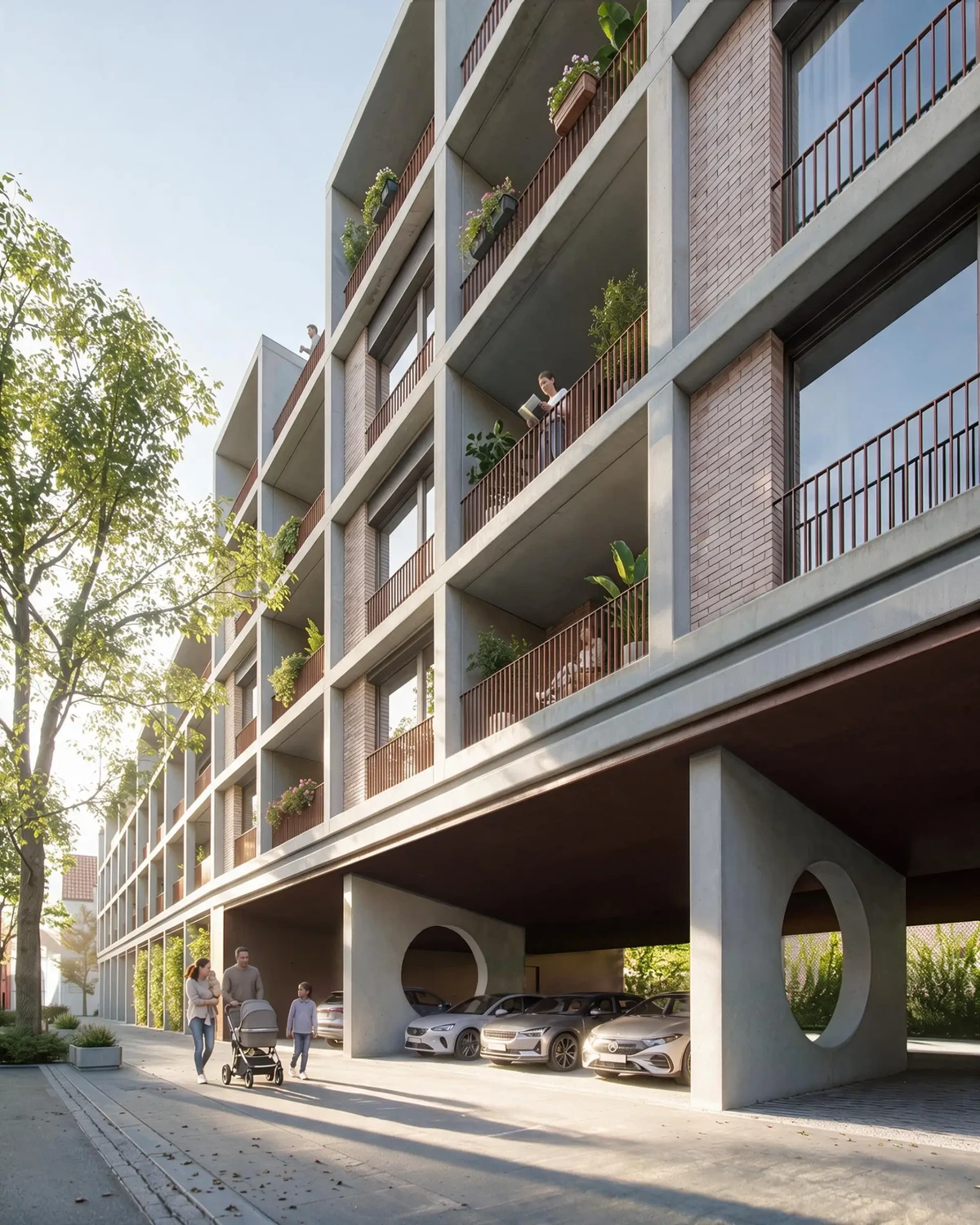Modern concrete apartment building with balconies; residents on balconies; family with stroller and child on sidewalk; cars parked beneath the building; sunny day.
