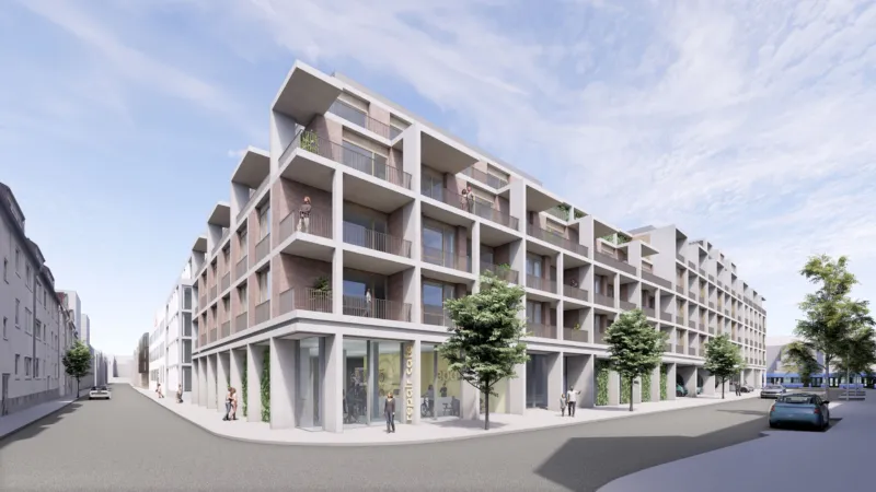 Modern apartment building with a grid of balconies and ground-floor storefronts along a city street; pedestrians and cars along the curb.
