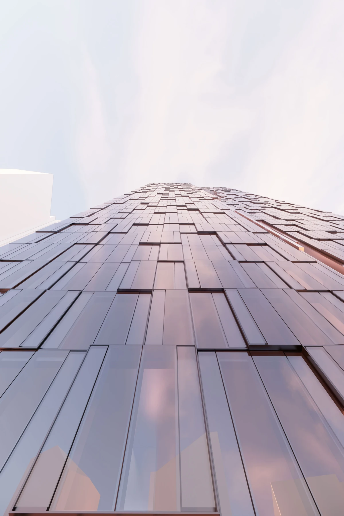 Low-angle view of a glass-clad skyscraper with reflective panels, reaching toward a pale pink sky.
