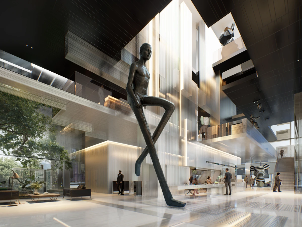 Tall dark-bronze humanoid sculpture in a modern glass atrium lobby, stepping forward as guests mingle around a multi-level reception area.