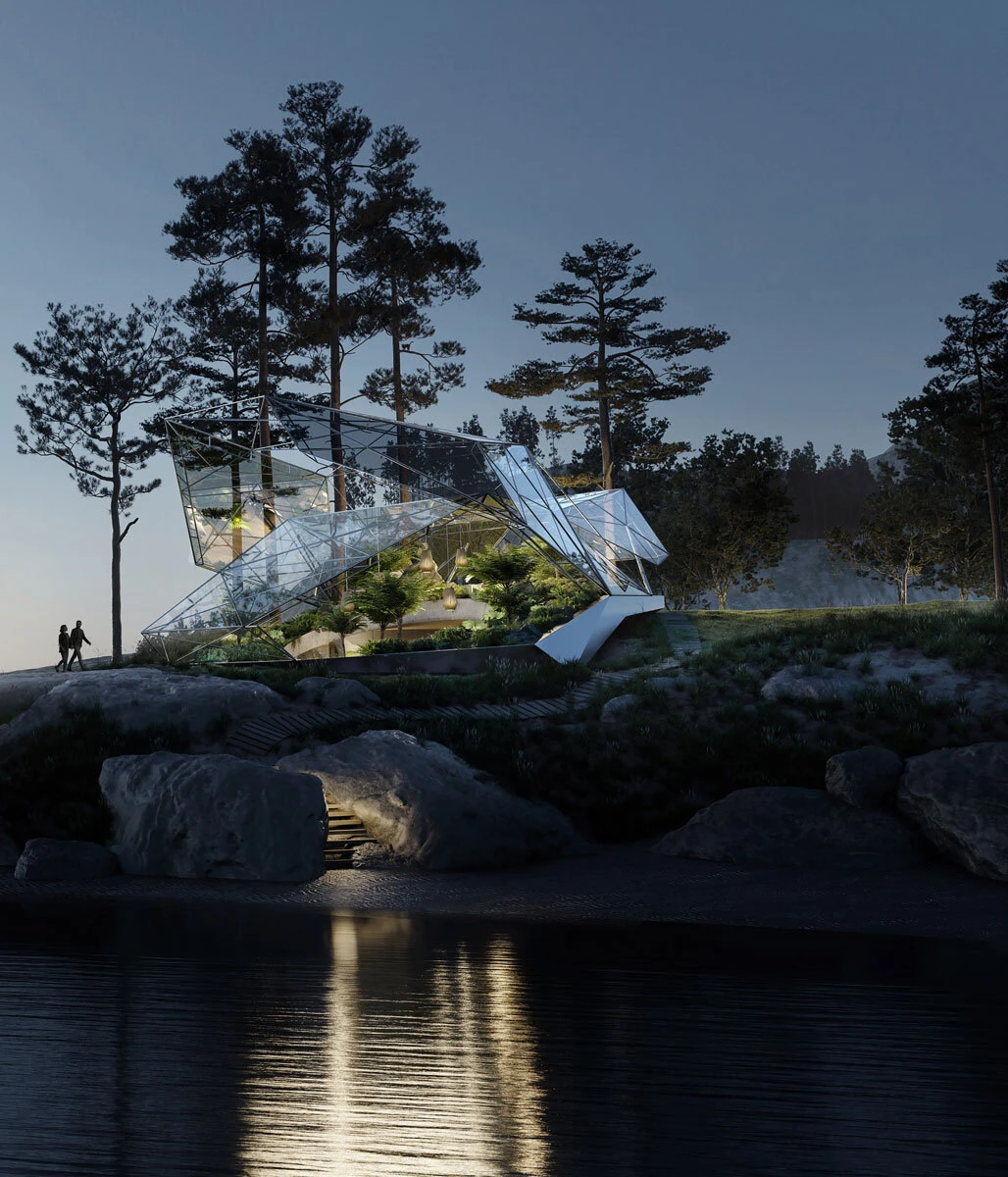 Geodesic glass pavilion on a rocky shoreline at dusk, surrounded by pine trees; two figures walk along a path as reflections glow on the water.