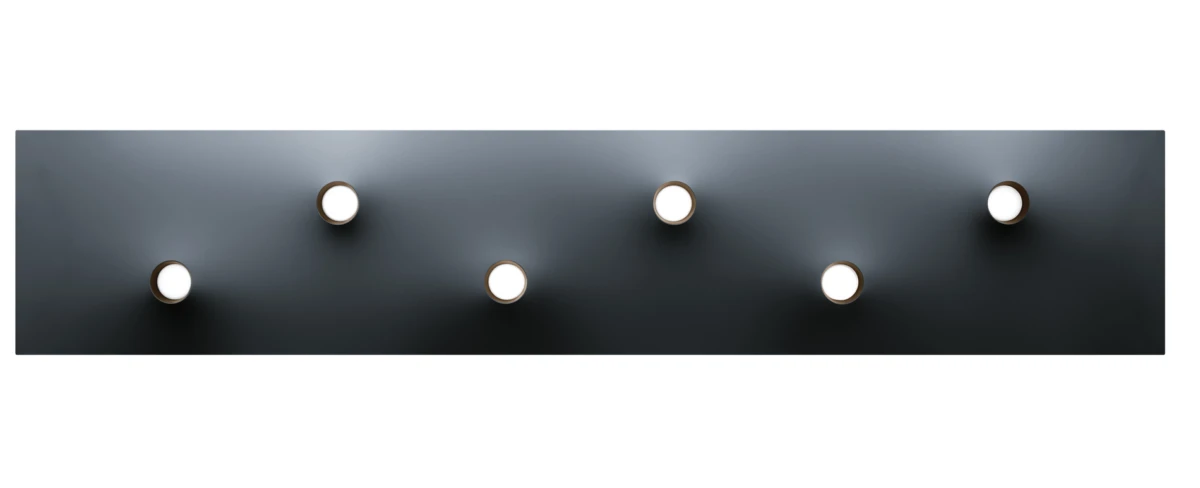 Dark rectangular wall panel with six circular light fixtures mounted.